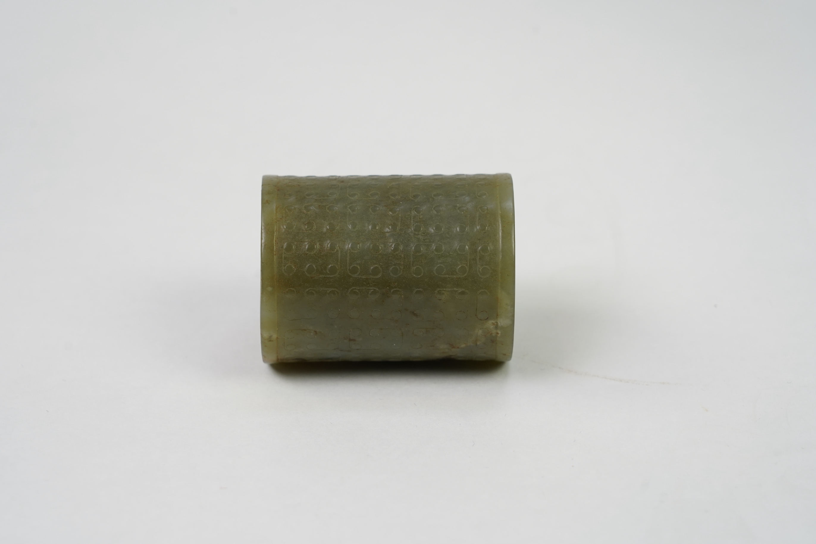 A Chinese green jade cylinder, Warring States period